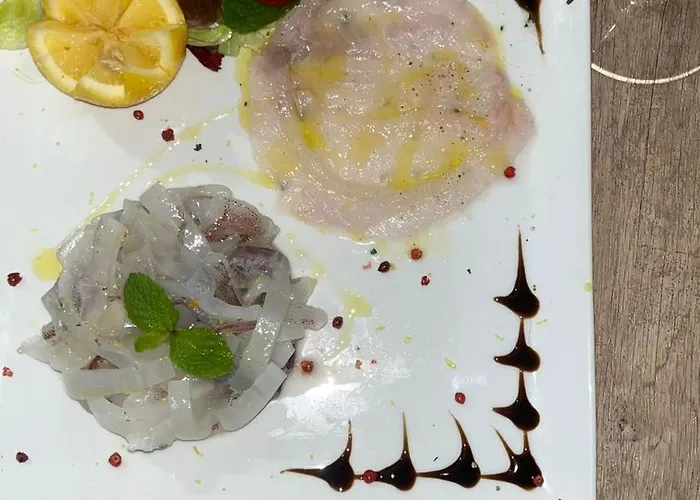 Al Pescatore & Restaurant Отель 4*